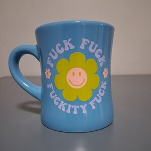 Blue Ceramic Mug with Flower Design